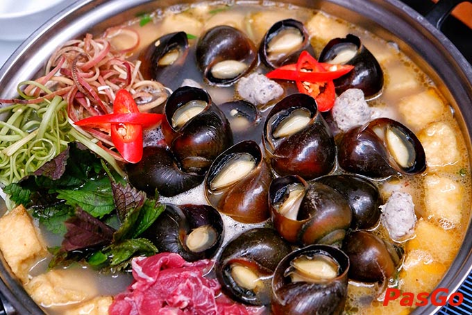 Lẩu ốc nấu mẻ thơm ngon mang đậm hương vị đồng quê